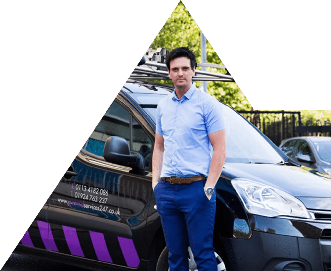 Harry McKeown, director of Pyramid Services, beside a liveried Pyramid Services van